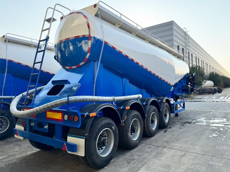Bulk cement truck trailer on the highway